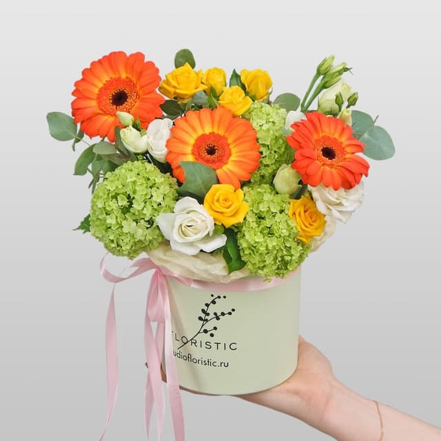 Композиция из Кустовых Роз, Эустомы и Гермини в шляпной коробке «Оранжевое счастье»