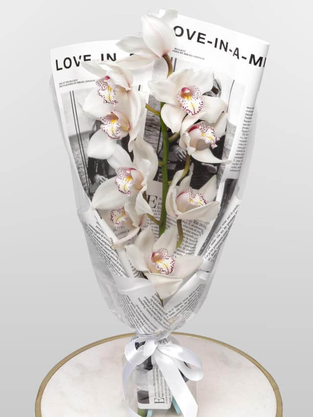 Букет из ветки Белой Орхидеи «Чистый Лист» Букет из ветки Белой Орхидеи «Чистый Лист»