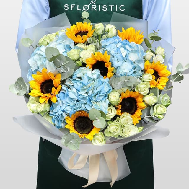 Букет из Подсолнухов, Гортензии и Кустовых роз «Солнечное небо» Букет из Подсолнухов, Гортензии и Кустовых роз «Солнечное небо»
